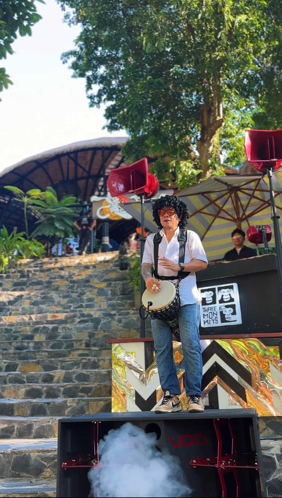 Percussionist performing beside the restaurant stone steps